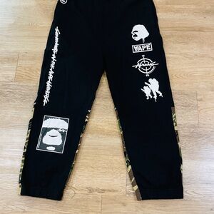 BAPE Sweatpants with Various Graphic Prints and Camo Details on Lower legs